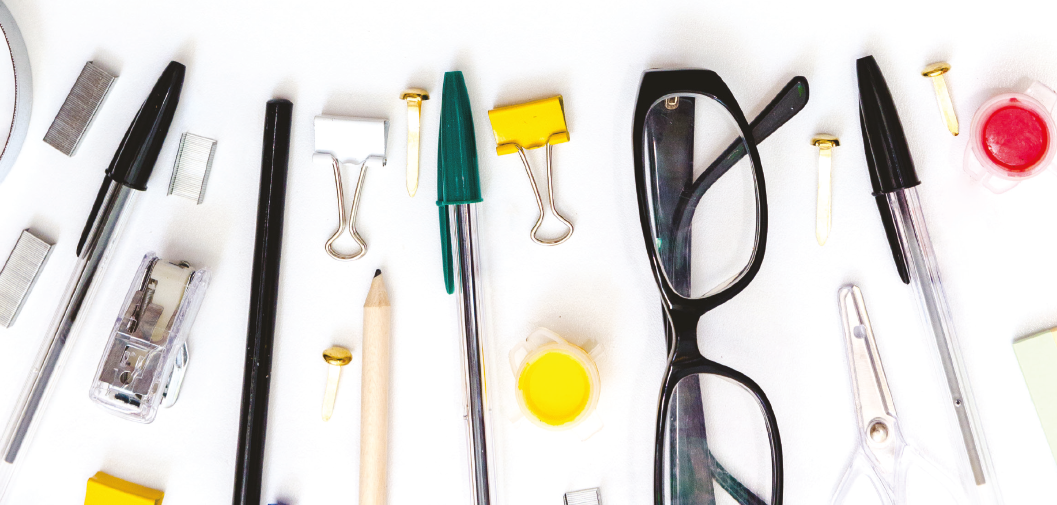 Stock image of miscellanious stationary and a pair of glasses