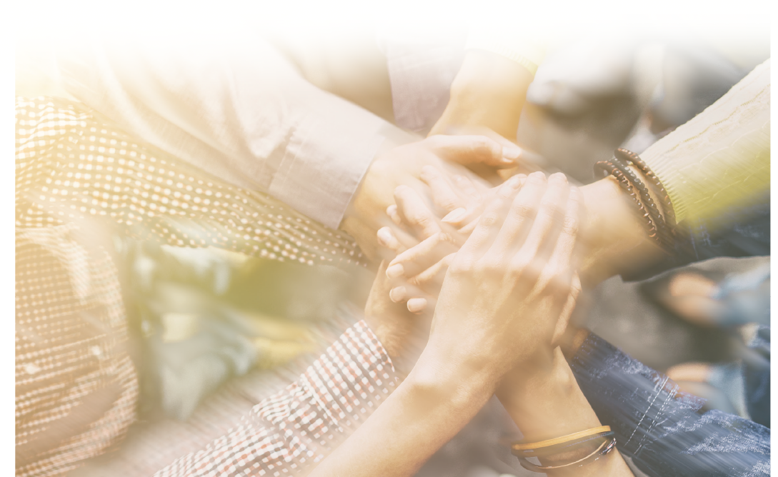 Stock image of hands on top of each other