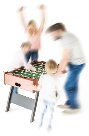 Blurred image of a family playing table football